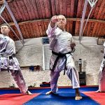 Karateka demonstrating punches